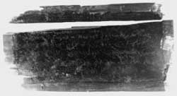 Stylus tablet 836 with the wax preserved, showing the letters incised in the wax